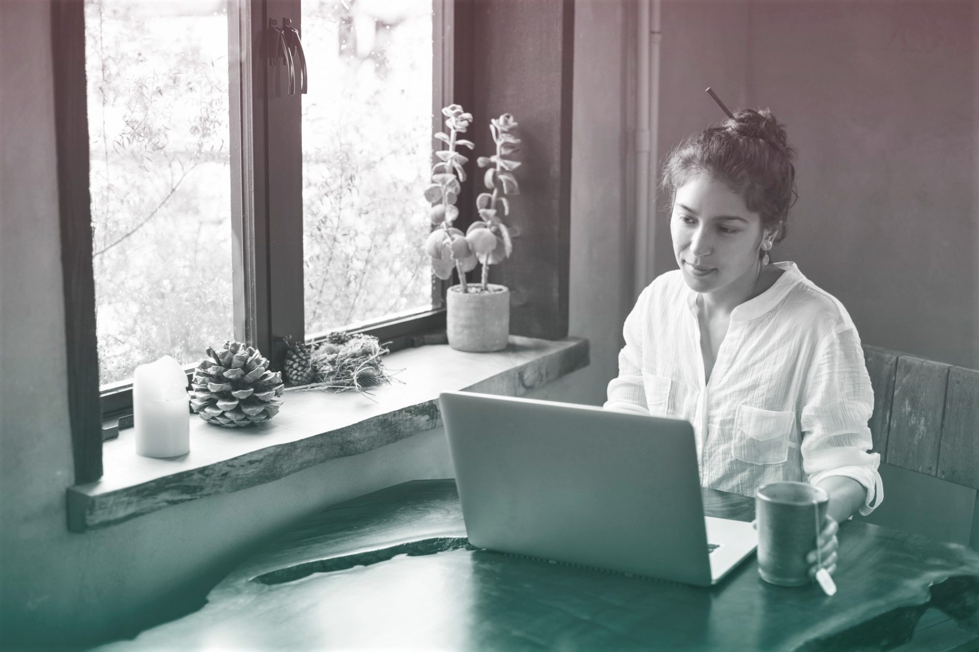 Young Adult Multi-ethnic Woman Working from Home on Laptop