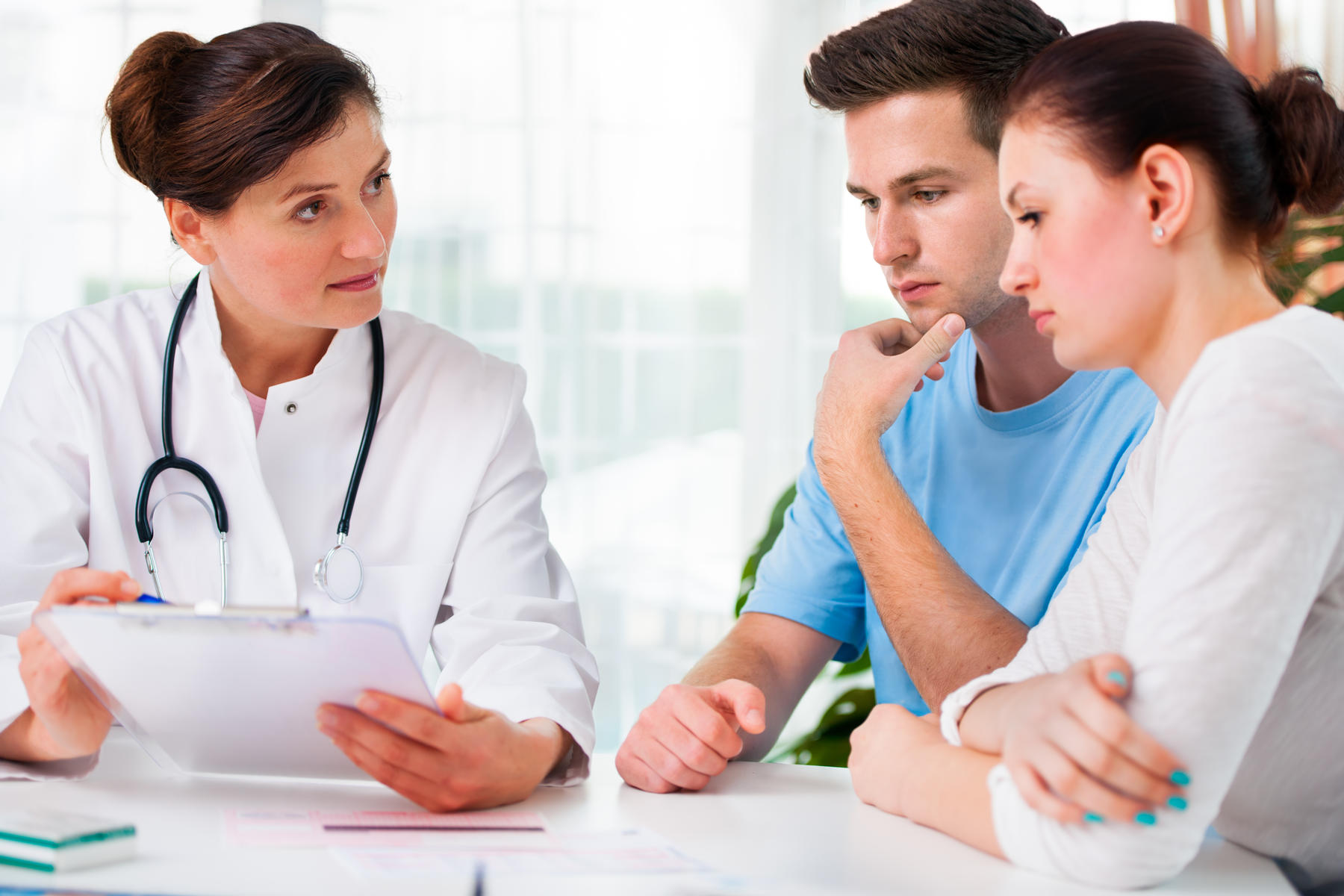 Couple Talking With Fertility Doctor