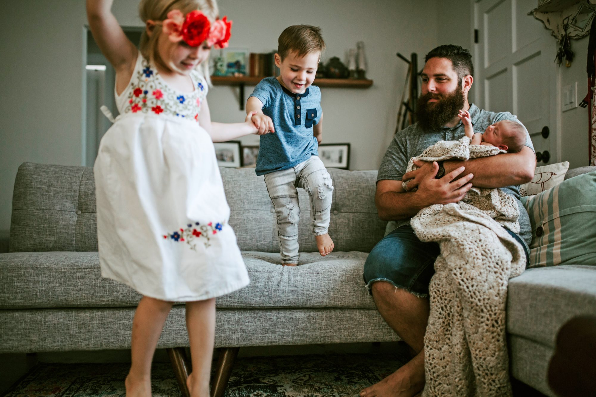 An image of a father and his children.