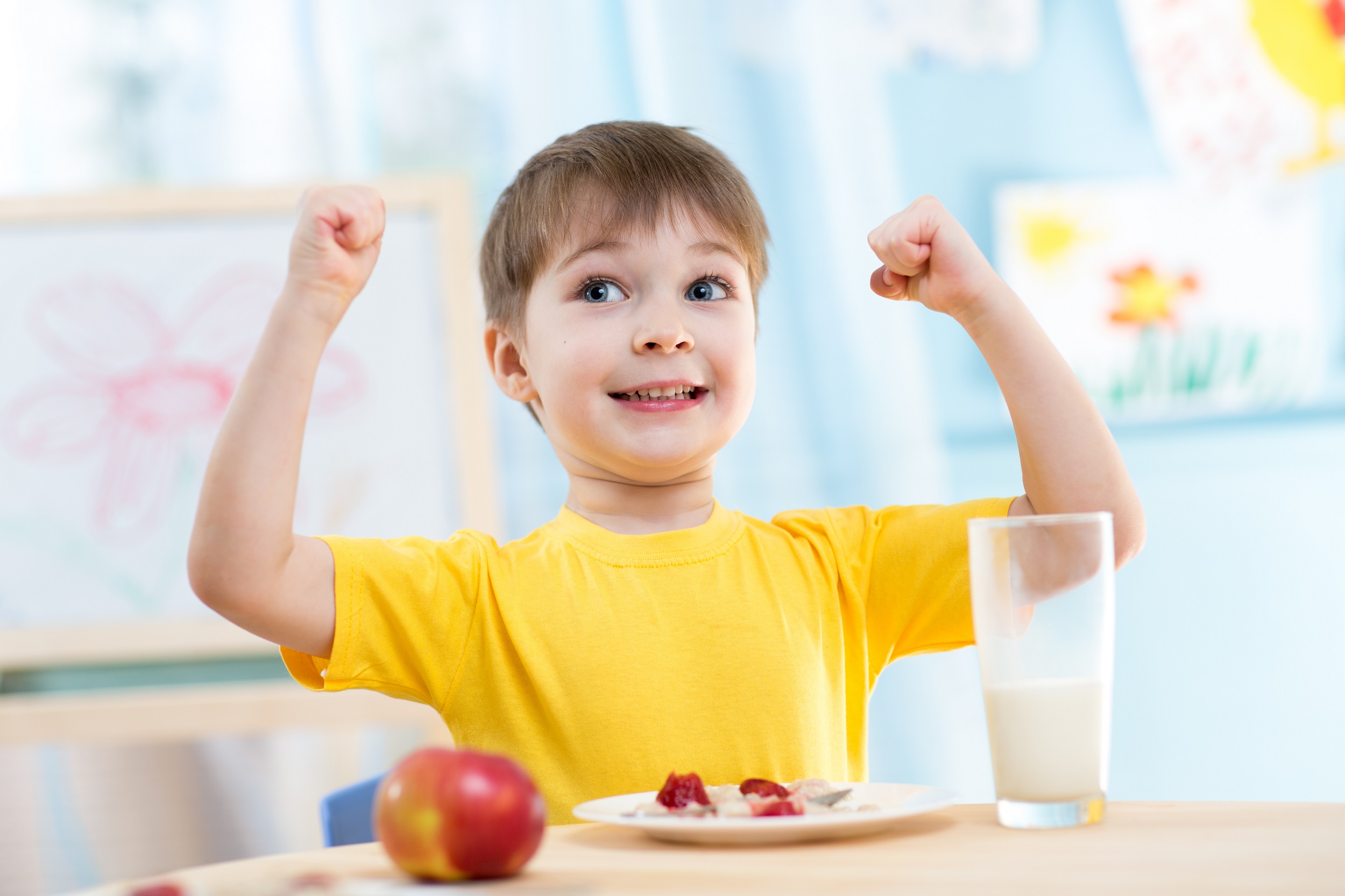 Young Boy Yellow Shirt Arms Up Healthy Food Eating