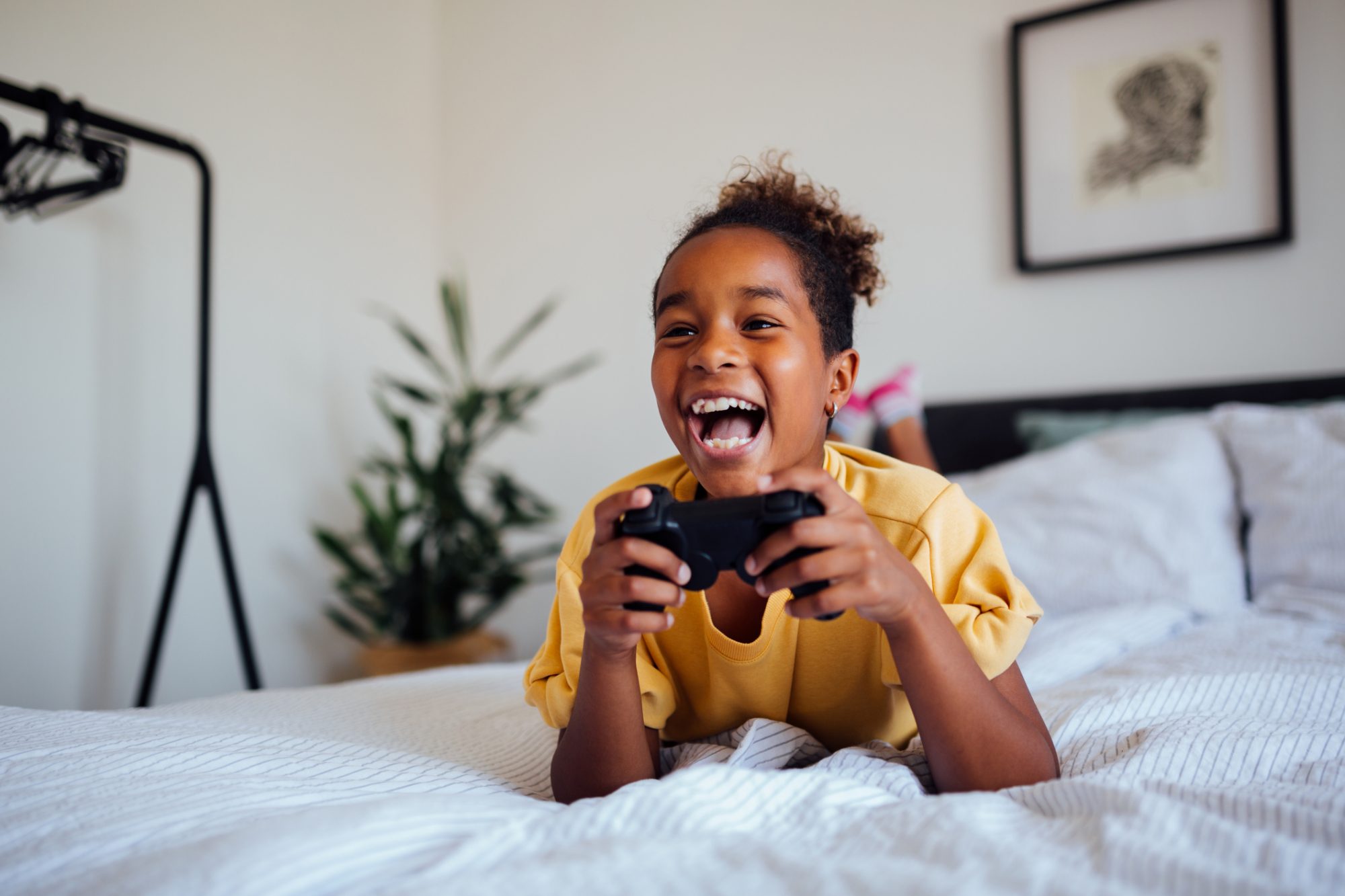 An image of a girl playing video games.