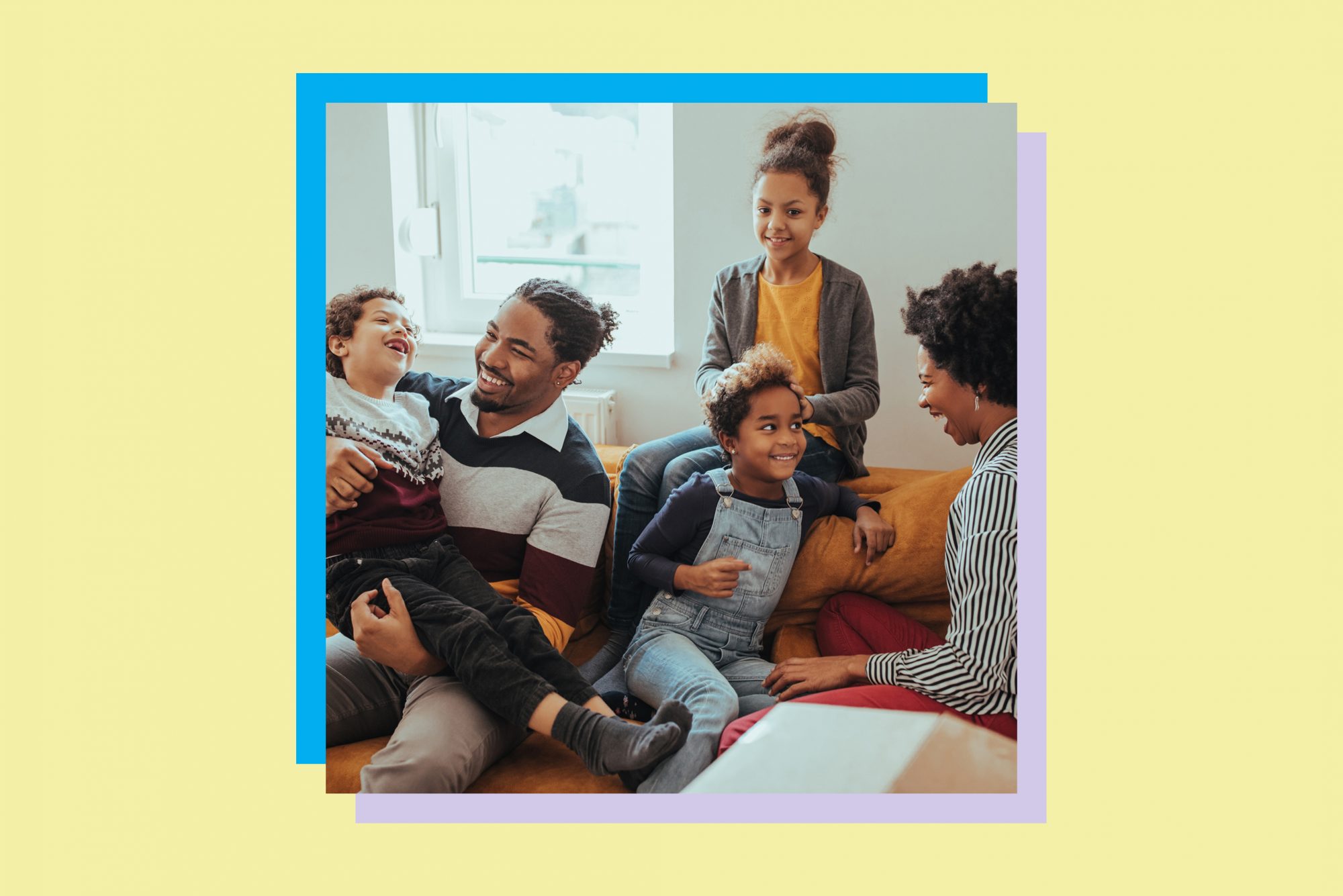 An image of a family on a couch.