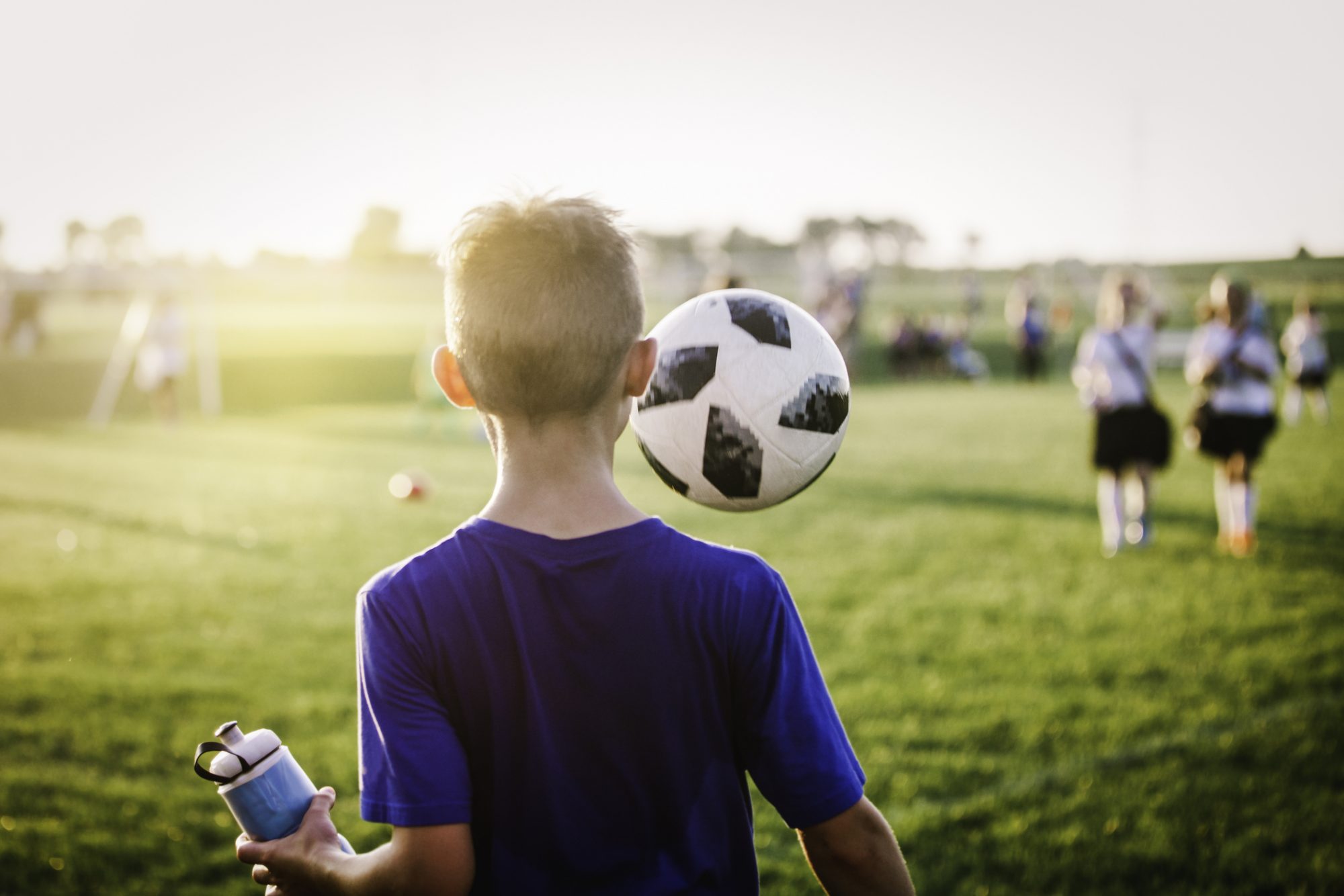 An image of a boy playing soccer.